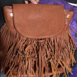 Fringe drawstring backpack